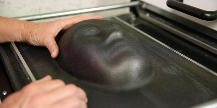 Face mould being vacuum formed